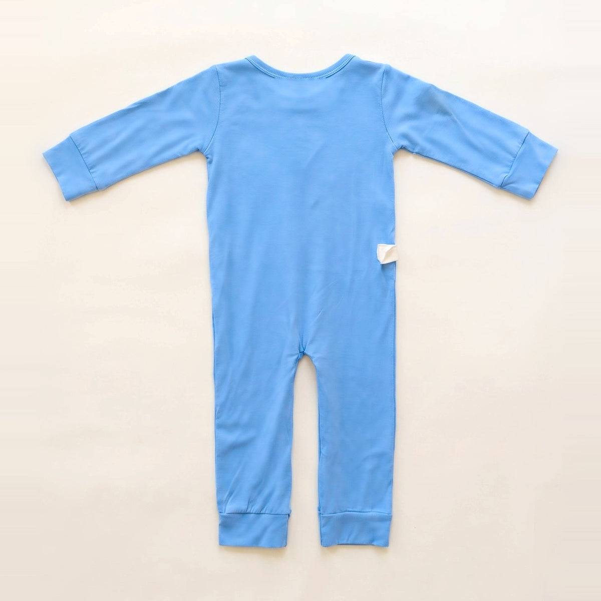 Back of the Sky Lullaby G/J tube bodysuit showing shoulder and lower-back RoutePoints line guides