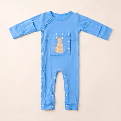 LineWear Chest Edition adaptive central line bodysuit in Sky Lullaby blue, laid flat with the PediaPouch chest pocket closed